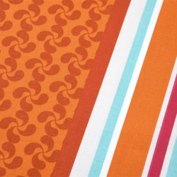 Tissu Enduit Lauburu orange en 155cm